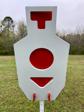 Load image into Gallery viewer, A 15inx30in 3/8in AR500 white steel shooting target with red vital swinging paddles, mounted on a T-post Mount and Studded T-Post.