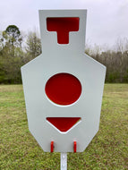 A 15inx30in 3/8in AR500 white steel shooting target with red vital swinging paddles, mounted on a T-post Mount and Studded T-Post.
